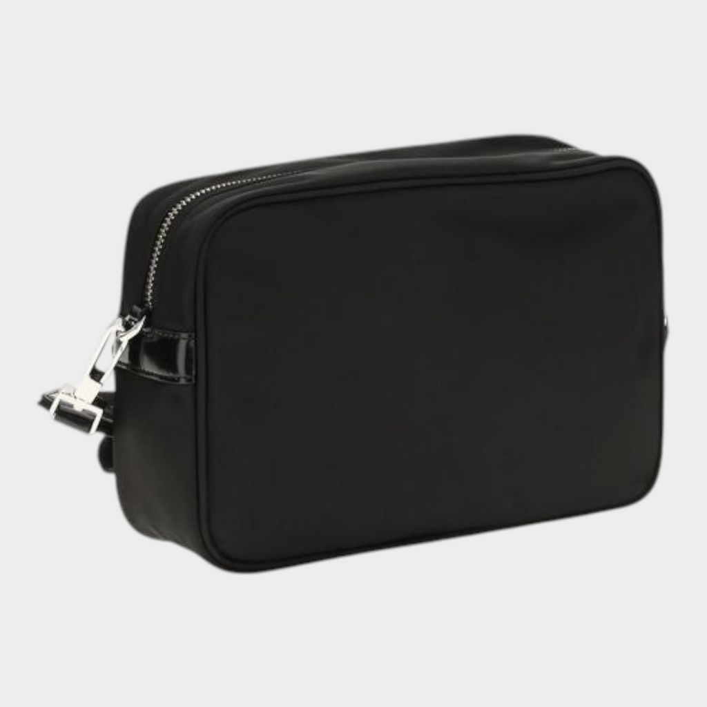 Esmire & Co black polyamide shoulder bag with a sleek rectangular design, zip closure, and silver hardware.