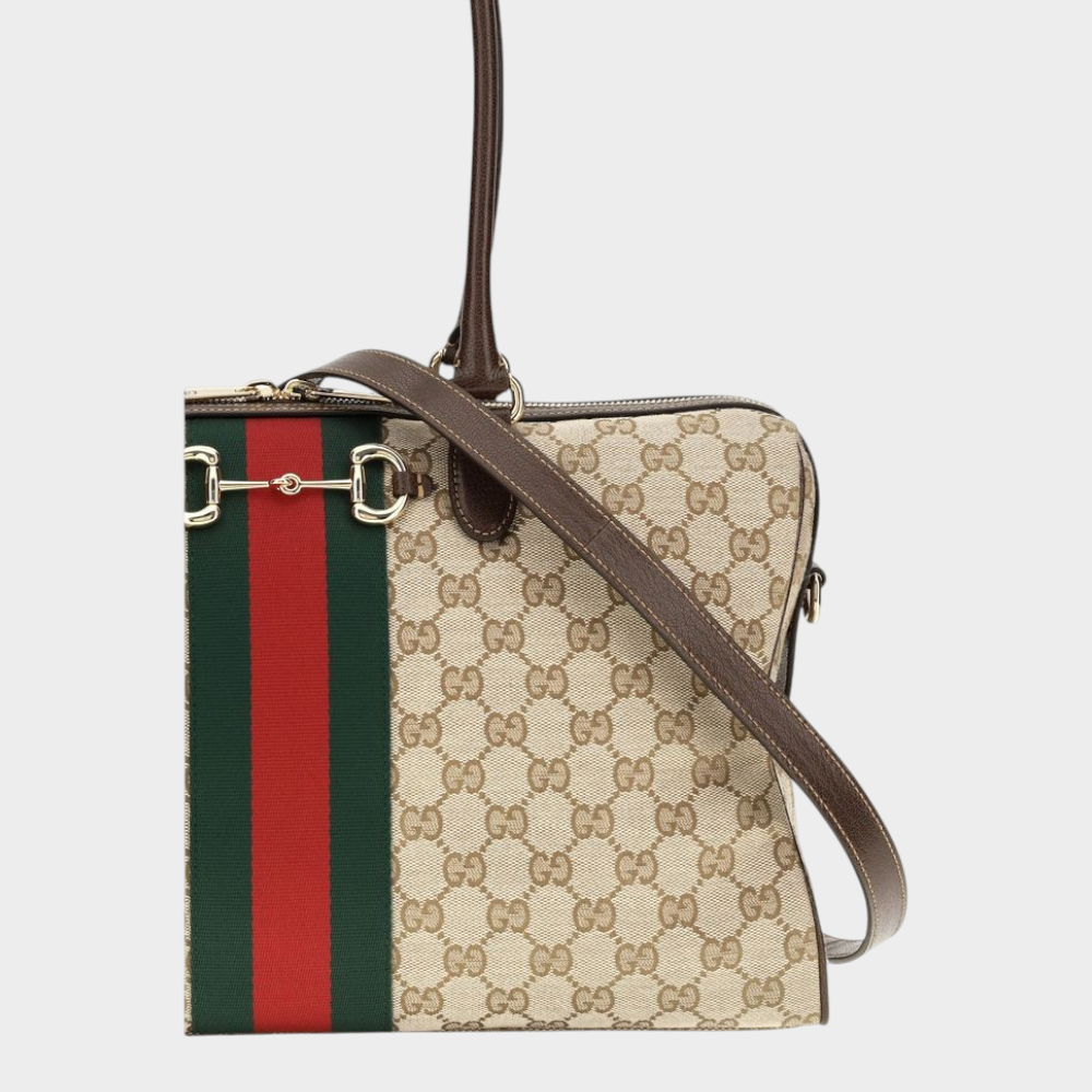Esmire & Co Gucci beige GG canvas handbag with signature red and green Web stripe and gold-tone Horsebit hardware.