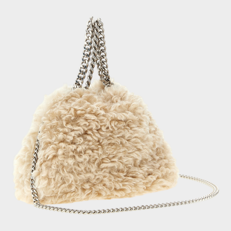 Esmire & Co beige faux shearling Falabella mini handbag with silver chain handles and shoulder strap