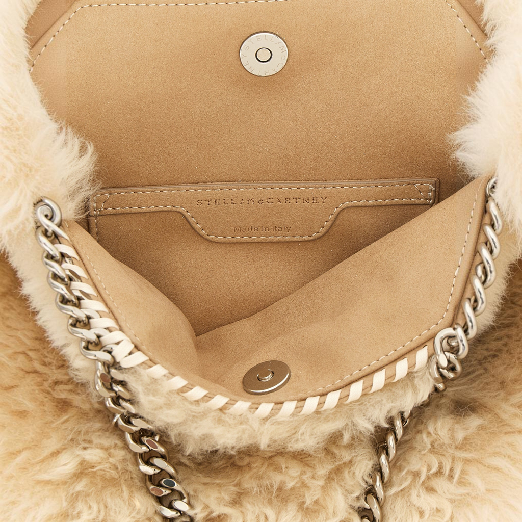 Esmire & Co beige shearling-effect Falabella handbag interior with silver chain and magnetic snap closure