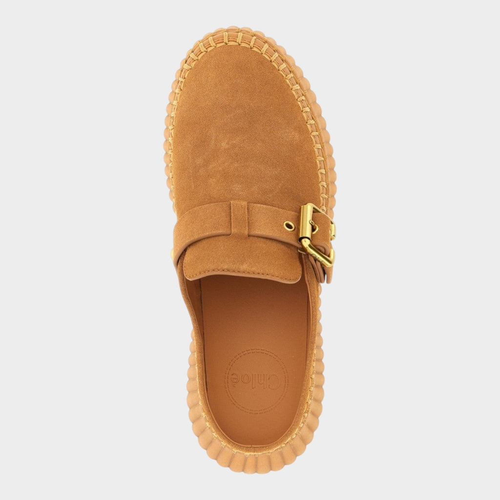 Esmire & Co beige suede calfskin wedge sandals with a gold buckle and contrast stitching, top-down view.