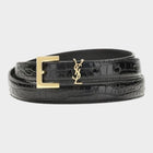 Esmire & Co black crocodile-embossed calf leather belt with a gold-tone Cassandre logo buckle.