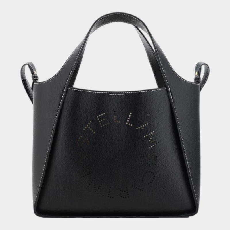 Esmire & Co black grained faux leather handbag with perforated Stella McCartney logo and dual top handles.