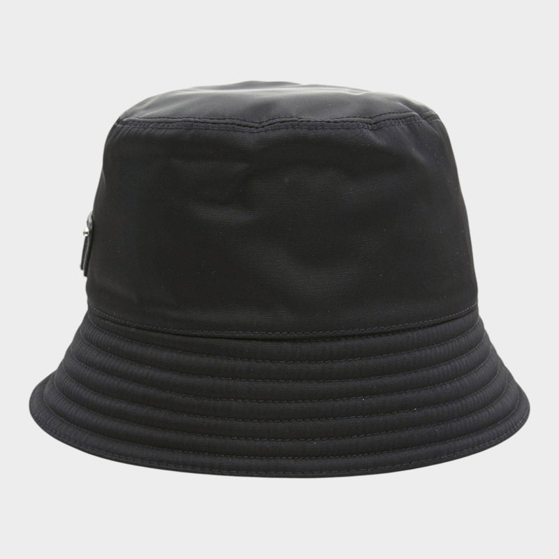 Esmire & Co black nylon bucket hat featuring a signature triangle logo on the side, crafted in Italy.