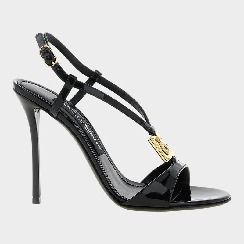 Esmire & Co black patent calfskin stiletto sandals with gold DG logo and adjustable ankle strap