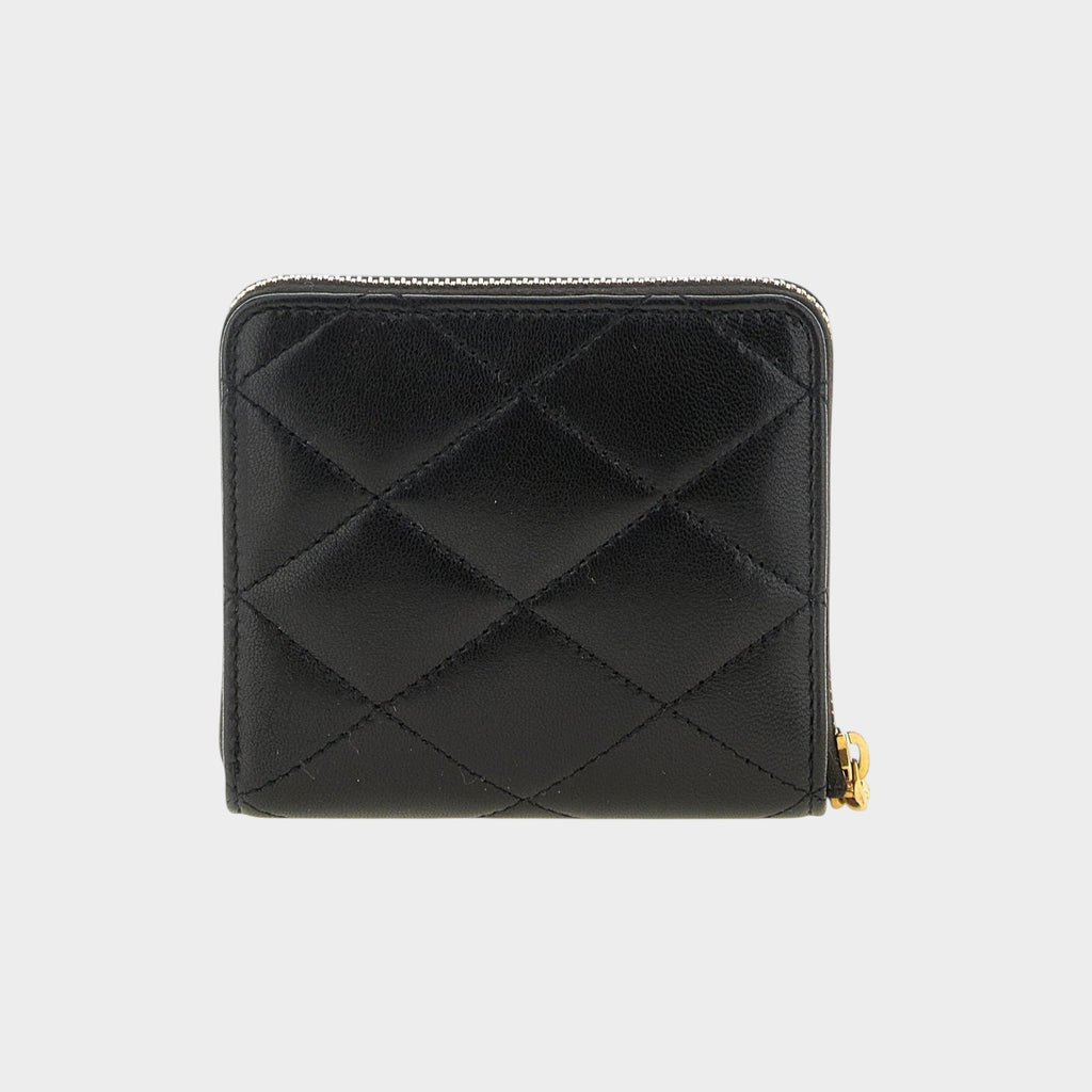 Esmire & Co black quilted leather zip around wallet with diamond pattern and gold hardware