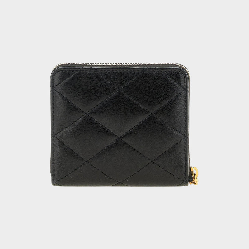 Esmire & Co black quilted leather zip around wallet with diamond pattern and gold hardware