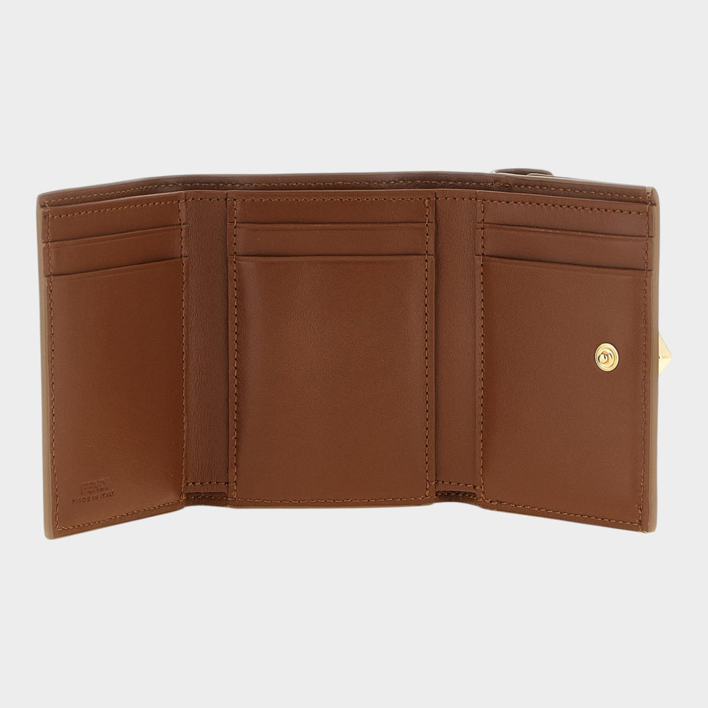 Esmire & Co brown calfskin leather trifold wallet interior showing card slots and gold snap closure