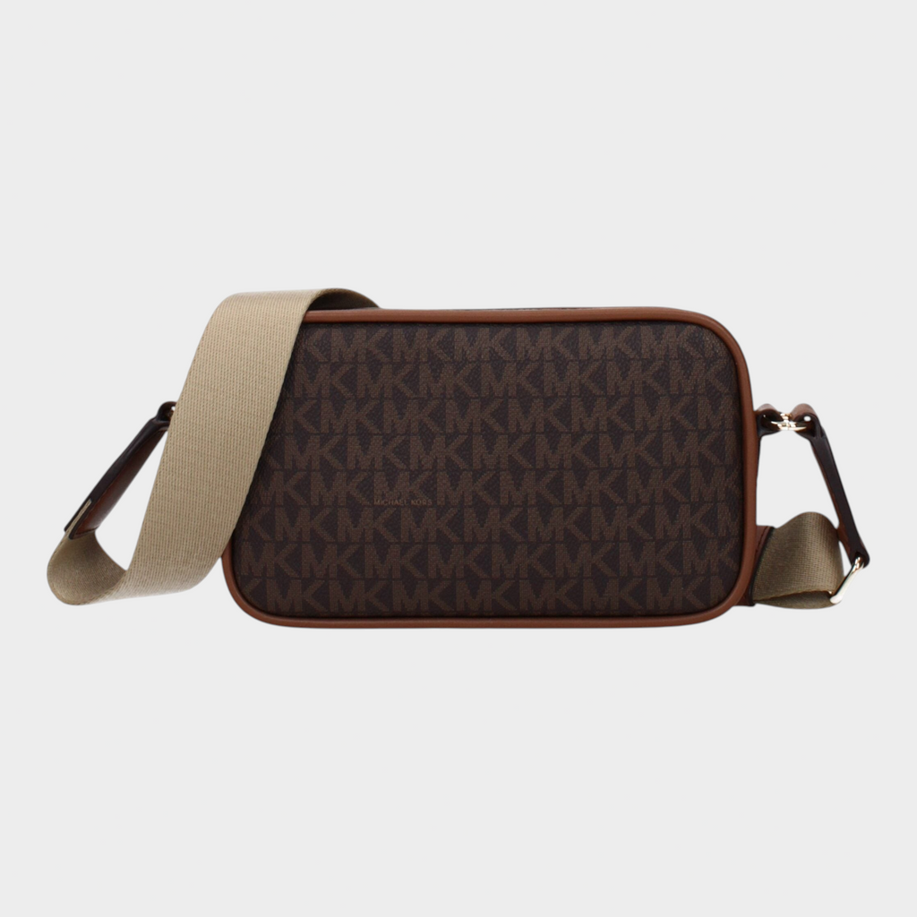 Esmire & Co brown Michael Kors fabric crossbody bag with signature logo print and adjustable beige shoulder strap.