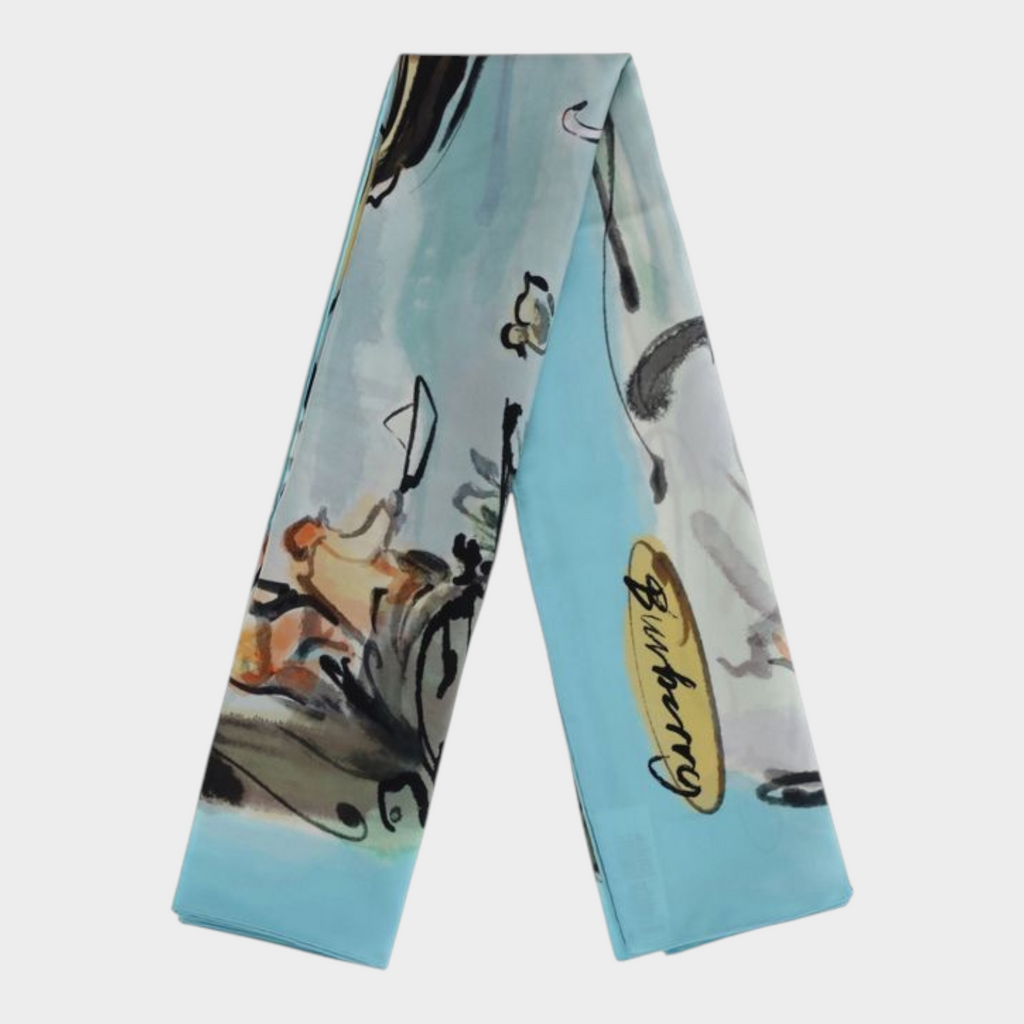 Esmire & Co Burberry Swan Lake silk scarf featuring a light blue watercolour park print and iconic knight illustration.