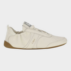 Esmire & Co Chloé beige fabric athletic sneakers with a round toe, lace-up fastening, and flexible rubber sole.