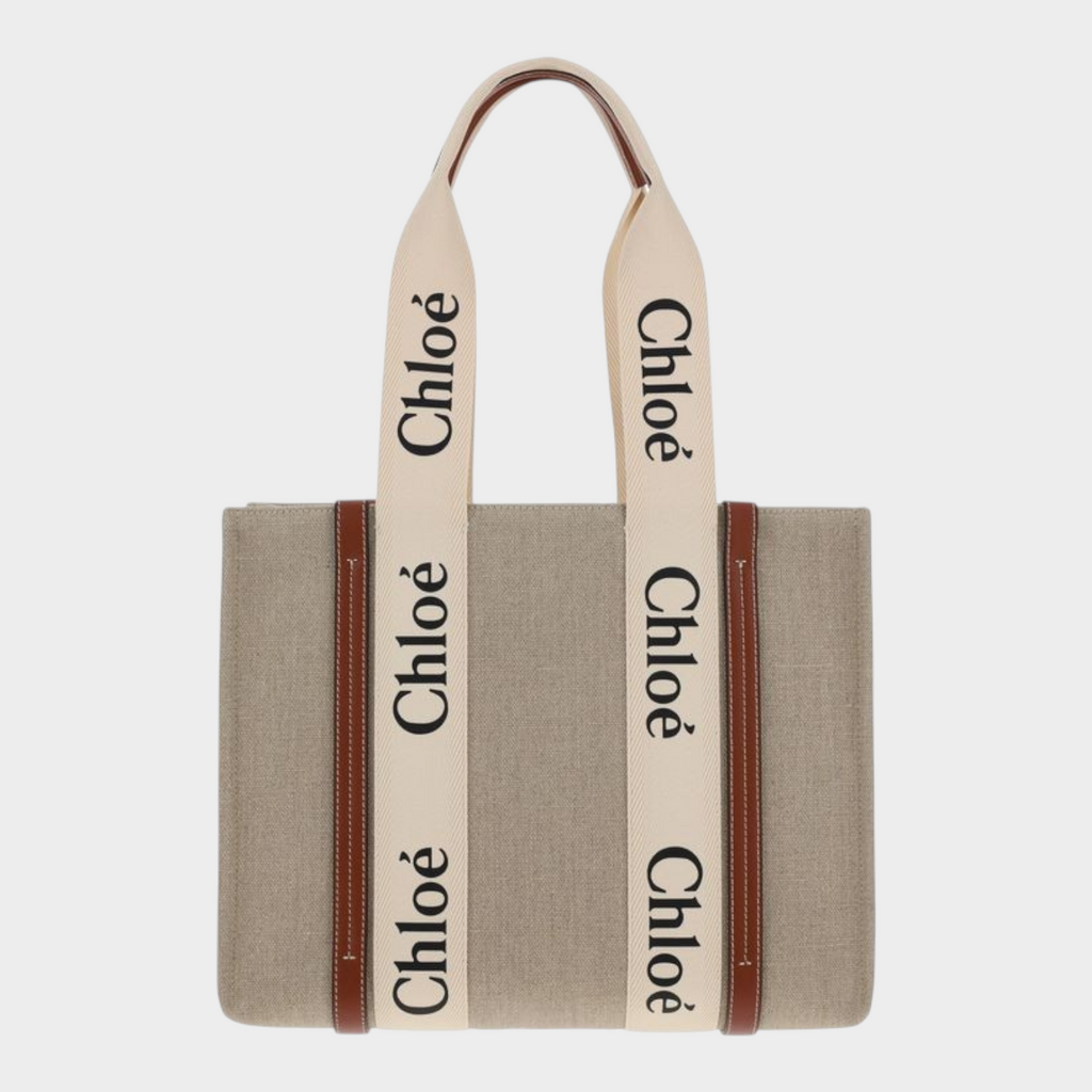Esmire & Co Chloé Woody beige linen tote bag with iconic logo ribbon handles and brown leather trim details.
