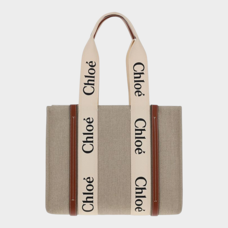 Esmire & Co Chloé Woody beige linen tote bag with iconic logo ribbon handles and brown leather trim details.