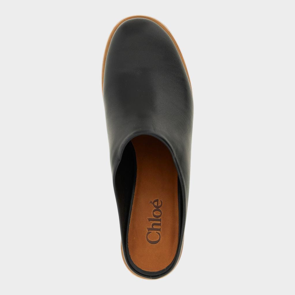Esmire & Co Chloé black smooth calfskin leather wedge sabot with a round-toe slip-on design and wood-effect sole.