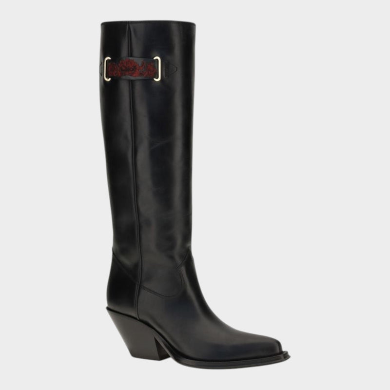 Esmire & Co Chloé black calf leather over-the-knee boots with floral embroidery, pointed toe, and Western-style heel.