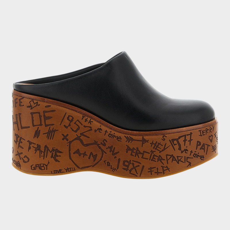 Esmire & Co Chloé black calfskin leather wedge sabot with a sculptural wood-effect platform featuring graffiti art.