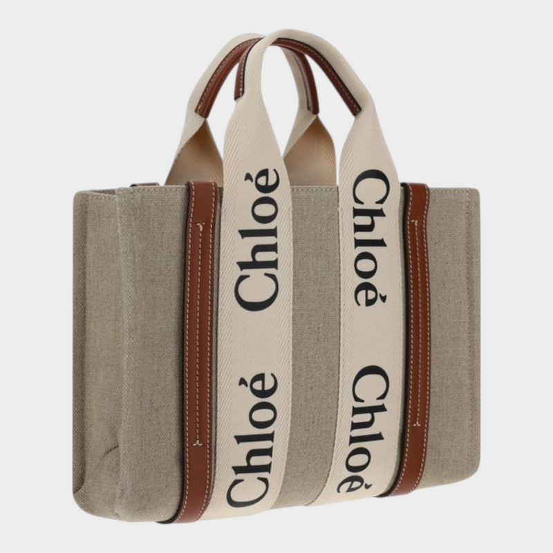 Esmire & Co Chloé Woody brown canvas tote bag with logo-printed cream straps and brown leather trim details.