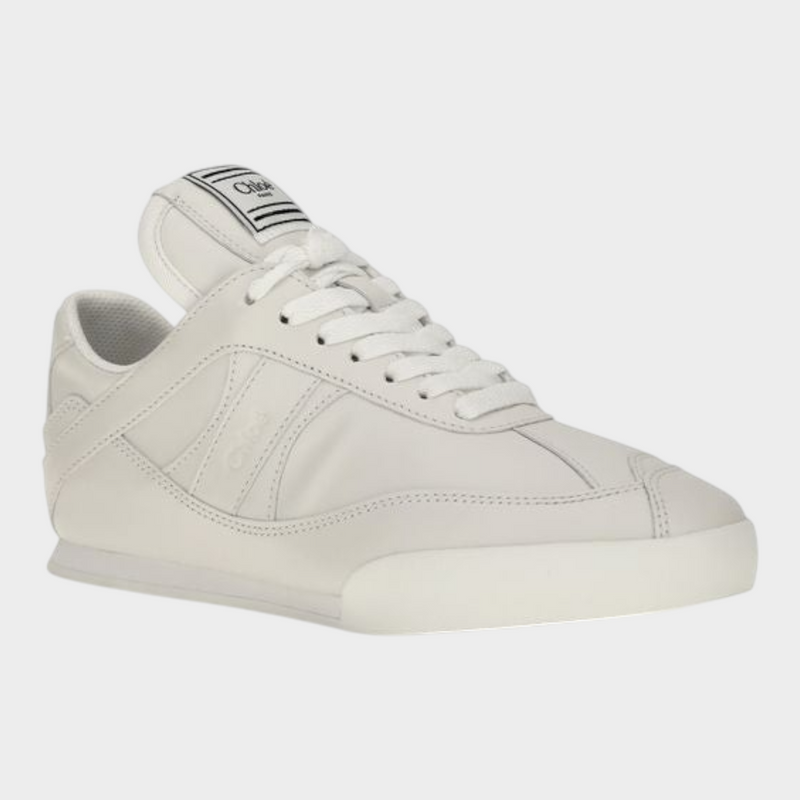 Esmire & Co Chloé white calf leather Kick sneakers with boxing-inspired tongue label and smooth suede detailing.