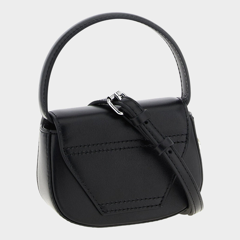 Esmire & Co Diesel 1DR XS black leather mini handbag with a structured silhouette and top handle.