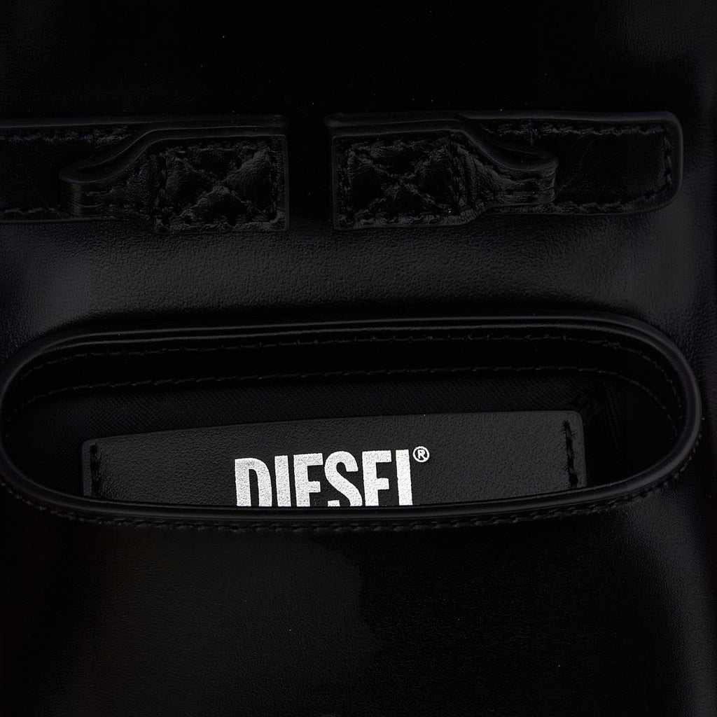 Esmire & Co Diesel 1DR XS black leather handbag featuring a sleek interior pocket with the Diesel logo branding.