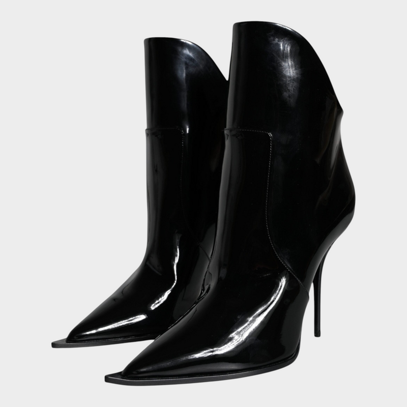 Esmire & Co Dolce & Gabbana black patent leather pointed ankle boots with high stiletto heels.
