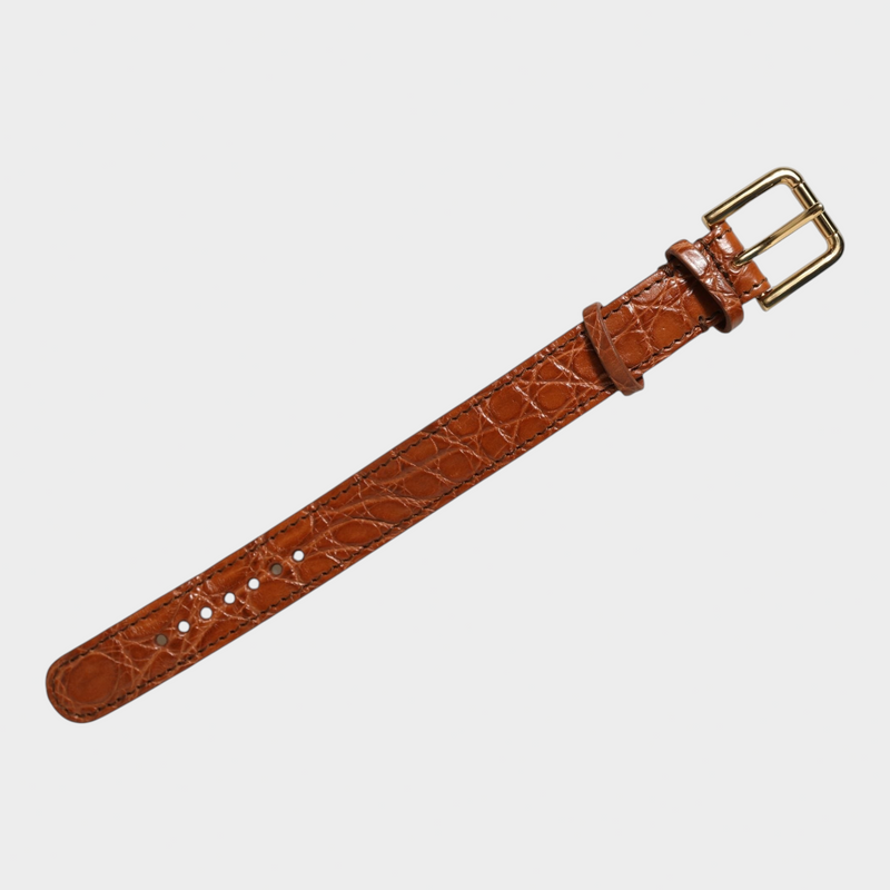 Esmire & Co Dolce & Gabbana brown caiman leather bracelet belt with a polished gold-tone buckle closure.
