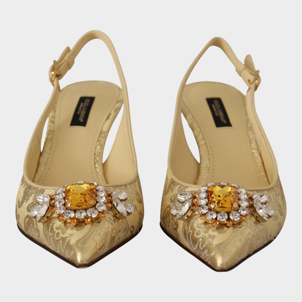 Esmire & Co Dolce & Gabbana gold slingback pumps featuring clear and yellow crystal embellishments and buckle closure.