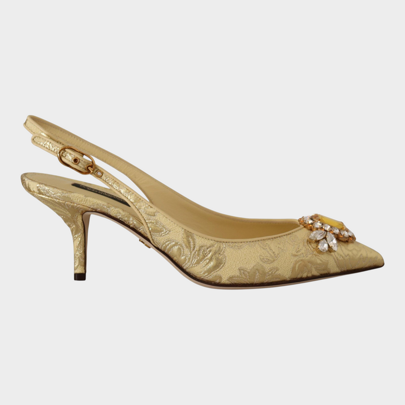 Esmire & Co Dolce & Gabbana gold slingback pumps with crystal embellishment and buckle closure.