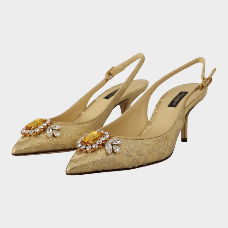 Esmire & Co Dolce & Gabbana gold slingback pumps featuring ornate yellow and clear crystal embellishments.