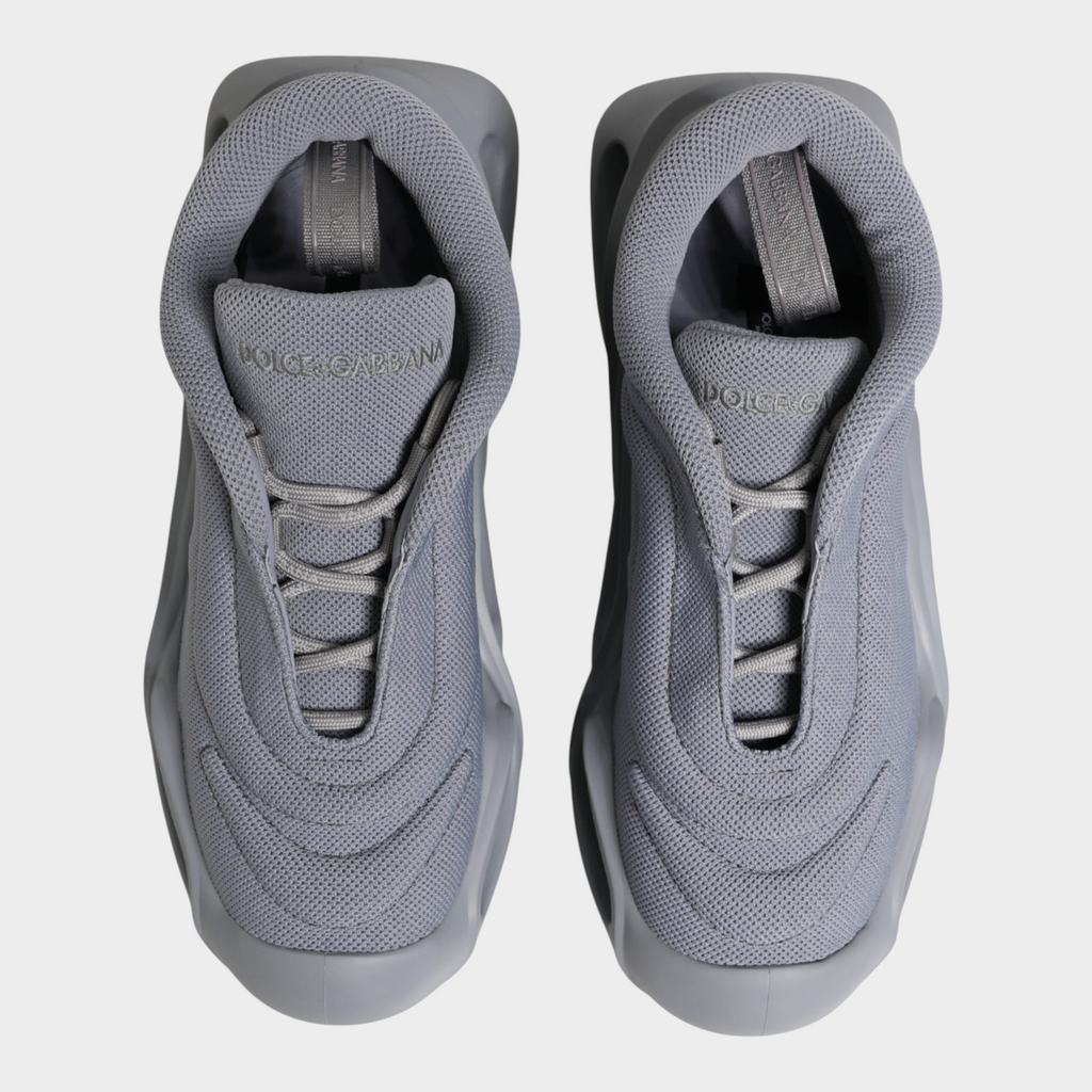 Esmire & Co Dolce & Gabbana grey slip-on low top sneakers with a wave-inspired design and durable rubber sole.