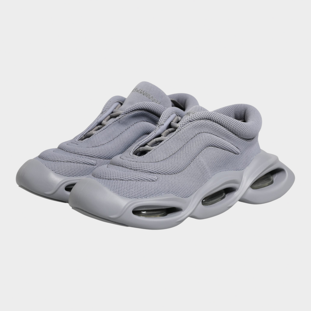 Esmire & Co Dolce & Gabbana grey slip-on sneakers with a wave-inspired design and durable rubber sole.