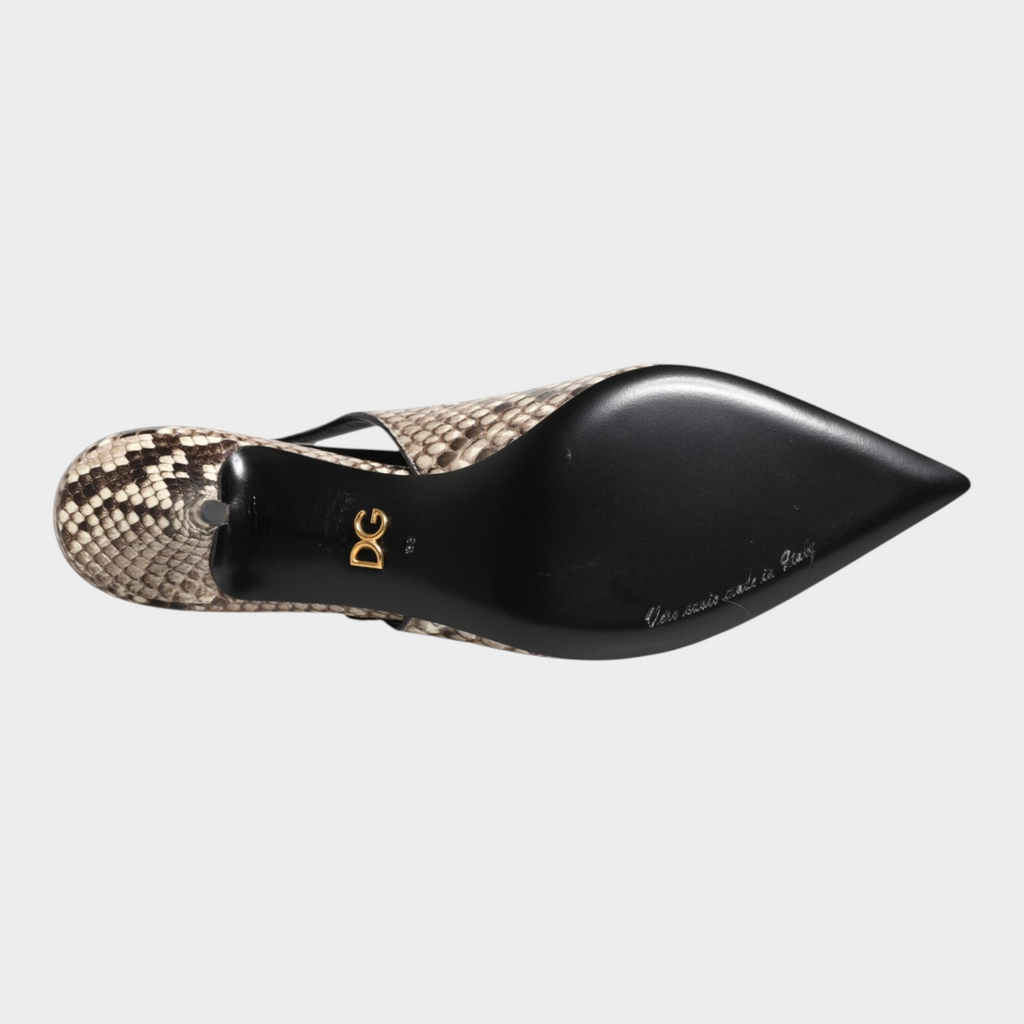 Esmire & Co Dolce & Gabbana slingback heels featuring a pointed toe and python leather sole with gold DG logo detail.