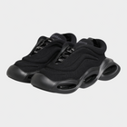 Esmire & Co Dolce & Gabbana Wave low-top sneakers in black with a sculptural wave-inspired sole and lace-up closure.