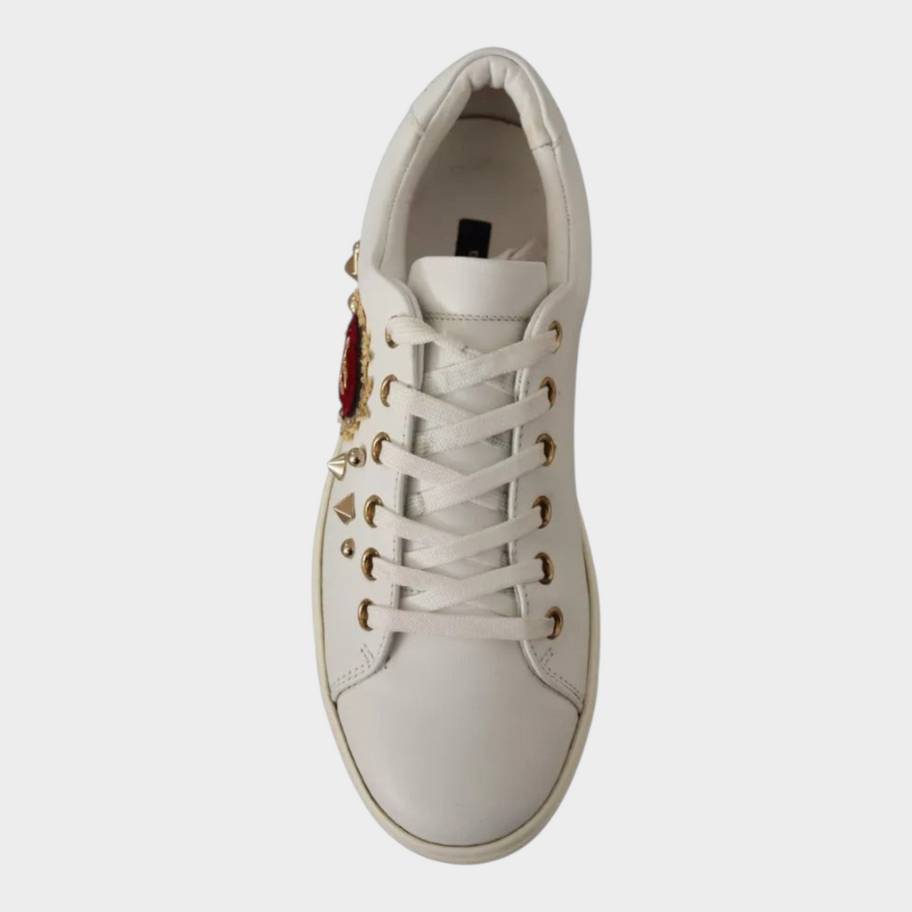Esmire & Co Dolce & Gabbana white leather sneakers featuring a red velvet heart and gold stud embellishments.