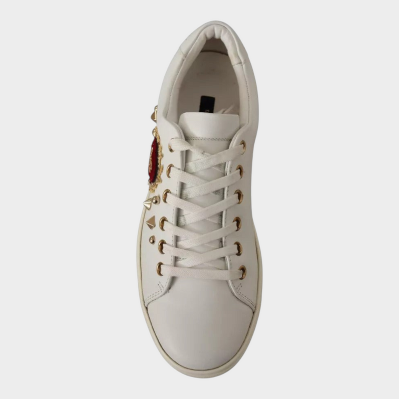 Esmire & Co Dolce & Gabbana white leather sneakers featuring a red velvet heart and gold stud embellishments.