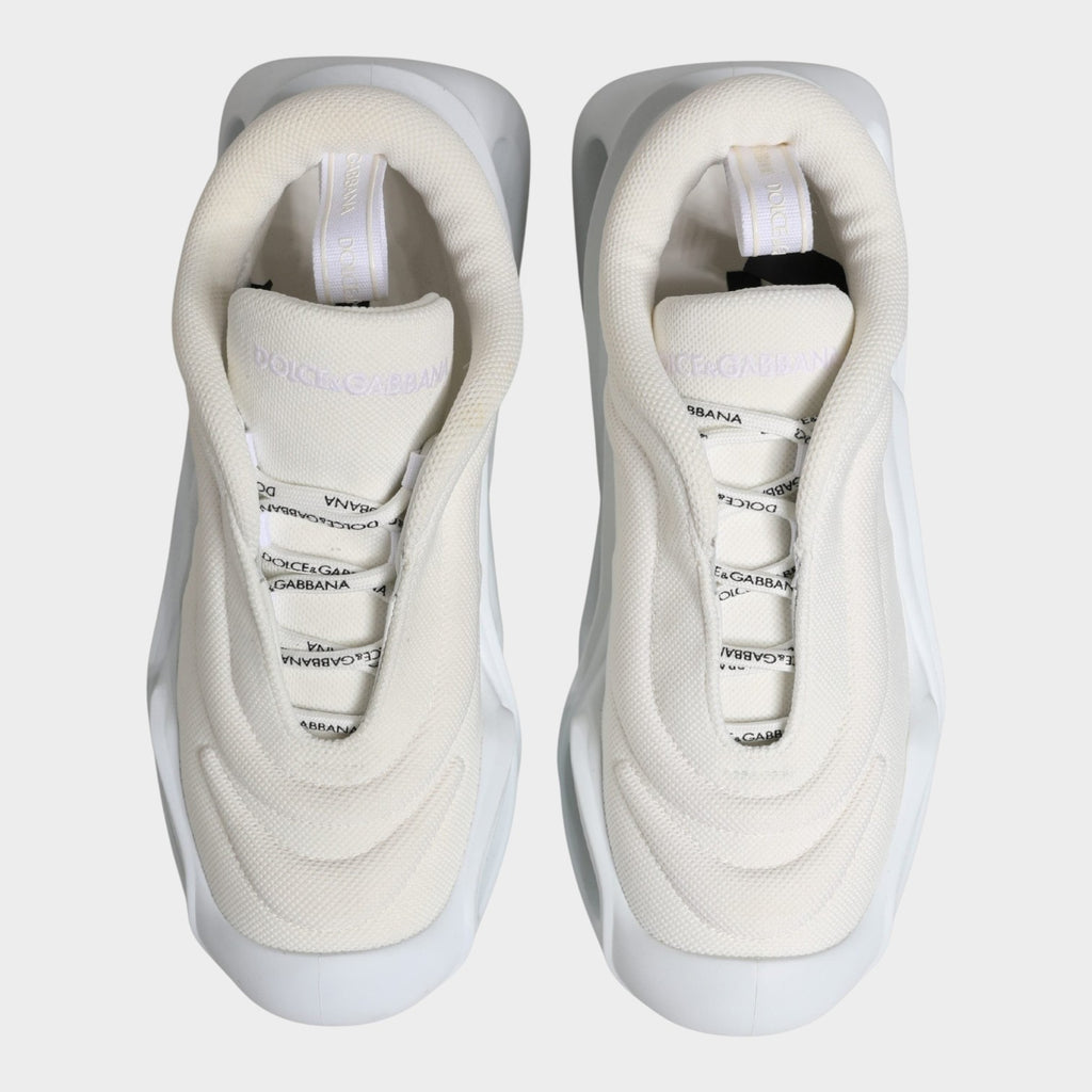 Esmire & Co Dolce & Gabbana white slip-on low top sneakers with wave-inspired silhouette and branded laces