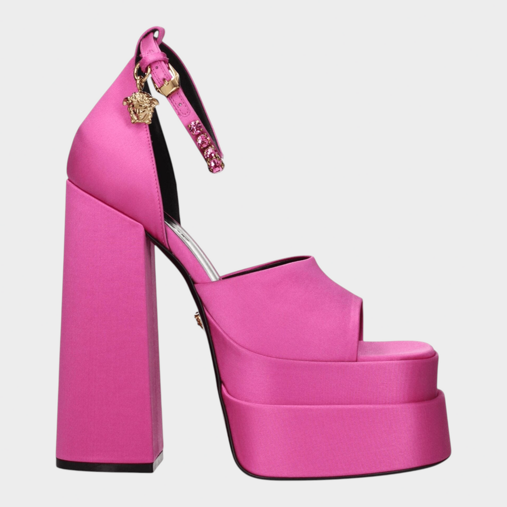 Esmire & Co fuchsia satin platform heels with rhinestone strap detail and gold Medusa charm on a high block heel.