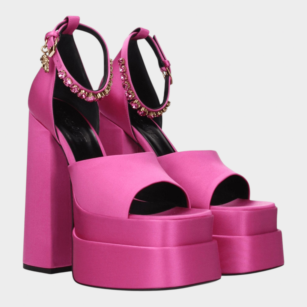 Esmire & Co fuchsia satin platform heels with rhinestone ankle straps and high block heels in an open-toe design.