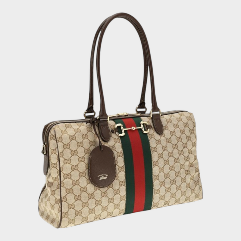 Esmire & Co Gucci beige GG canvas handbag with Web stripe, Horsebit hardware, and brown leather handles.
