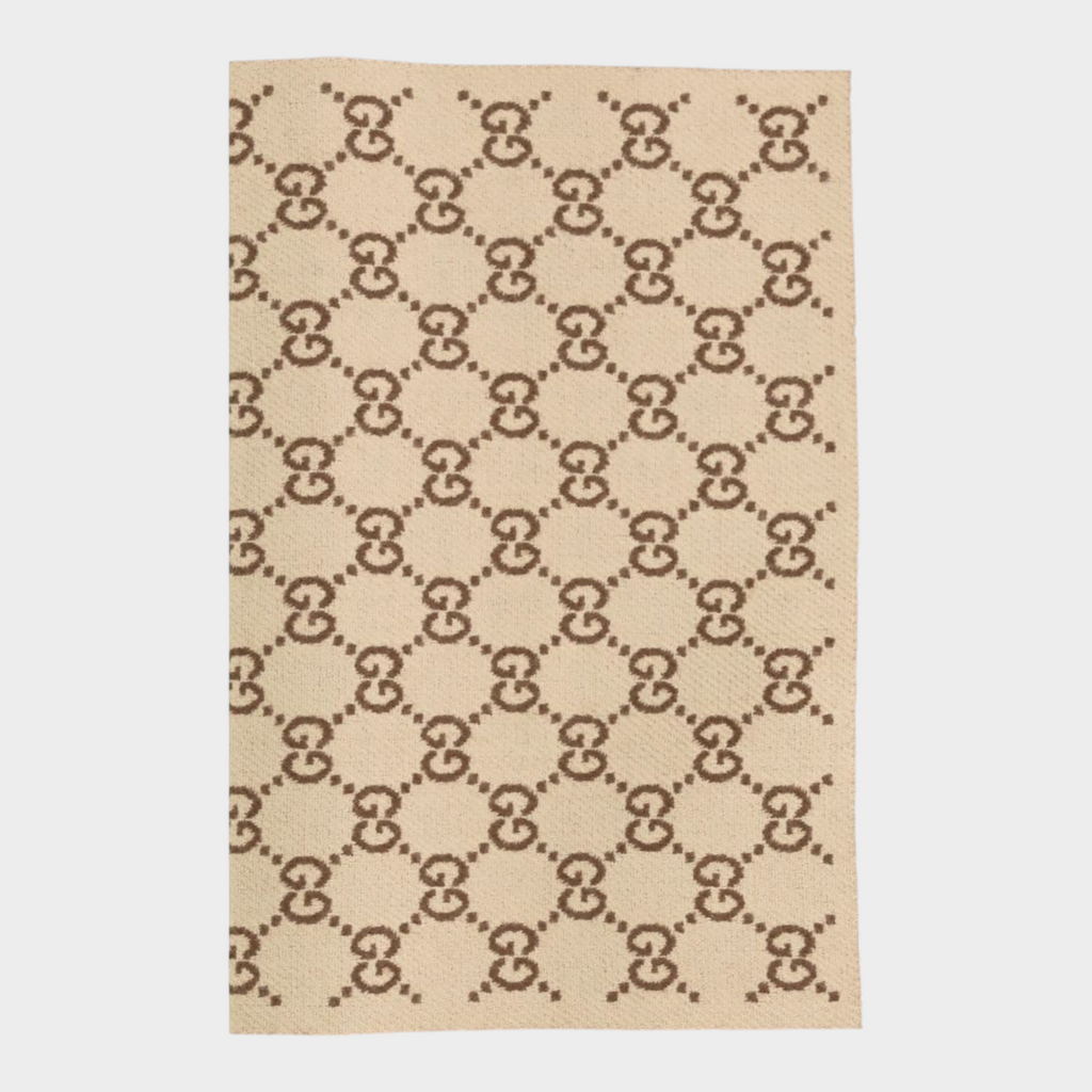 Esmire & Co Gucci beige merino wool scarf featuring an all-over brown GG monogram pattern and fringed edges.