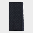 Esmire & Co black wool Gucci scarf featuring an all-over GG logo embroidery and elegant frayed ends.