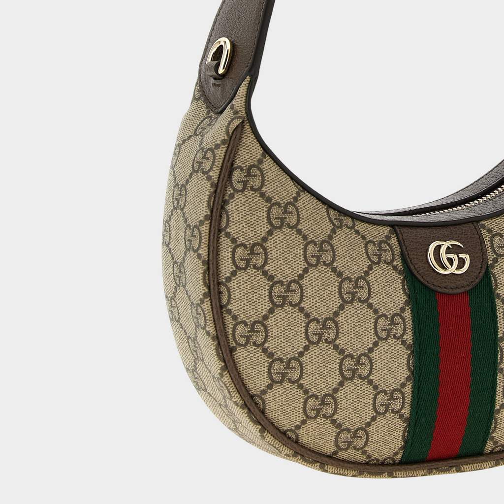Esmire & Co Gucci Ophidia crescent bag in beige GG Supreme canvas with brown leather trim and green-red Web detail.