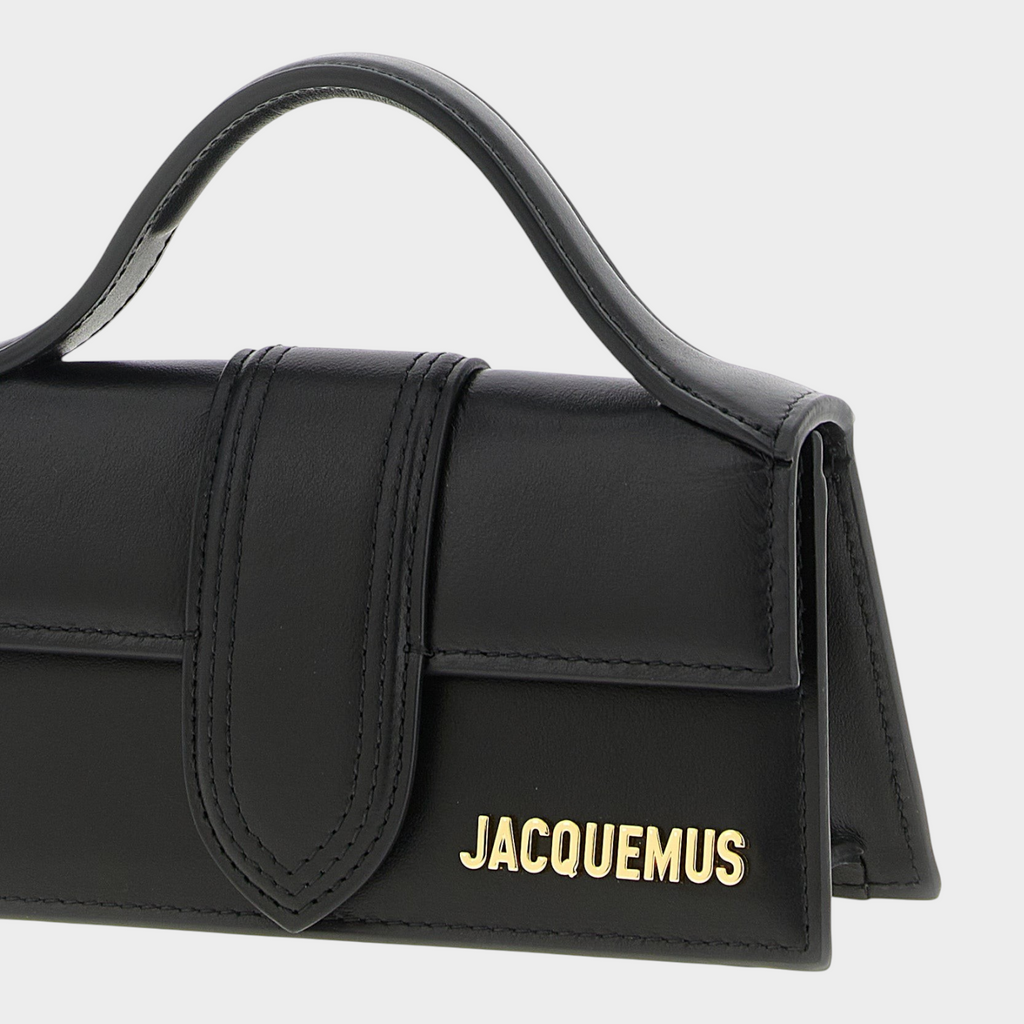 Esmire & Co Jacquemus Le Bambino black cowhide leather handbag with gold metal logo and fixed top handle