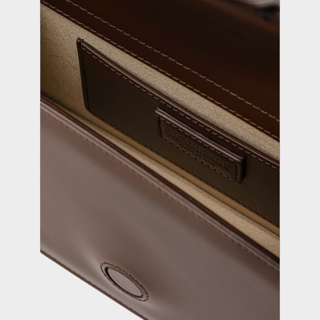 Esmire & Co brown leather Jacquemus Le Grand Bambino handbag interior with fabric lining and embossed logo patch