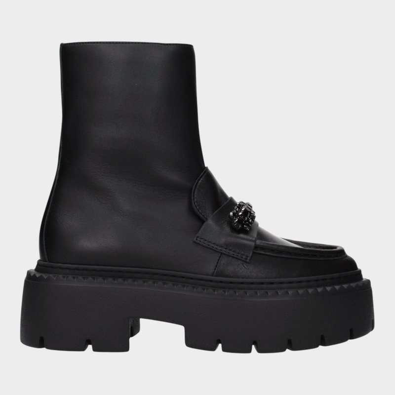 Esmire & Co Jimmy Choo Bryer flat black leather ankle boots with a chunky lug sole and decorative front hardware.
