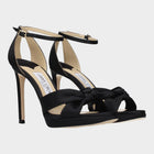 Esmire & Co Jimmy Choo Rosie black satin platform heels with a knotted front strap and adjustable ankle buckle.