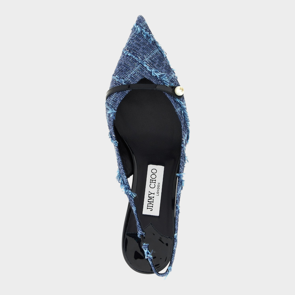 Esmire & Co Jimmy Choo Amita navy blue denim slingback pumps with frayed edges, pearl detail, and patent leather strap.