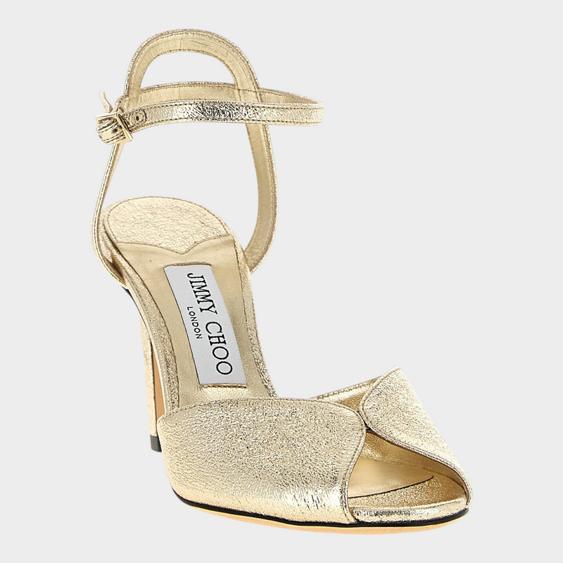 Esmire & Co Jimmy Choo Sacora gold metallic goatskin stiletto sandals with peep-toe and adjustable ankle strap.