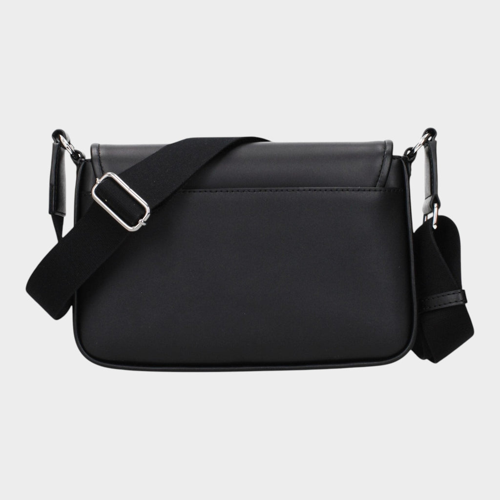 Esmire & Co Michael Kors black leather crossbody bag with an adjustable shoulder strap and silver hardware.