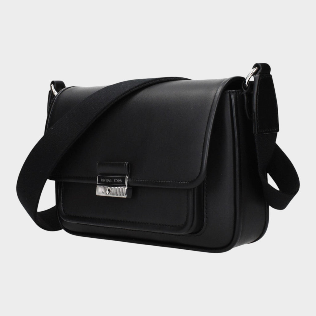 Esmire & Co Michael Kors black leather crossbody bag with front logo and adjustable shoulder strap